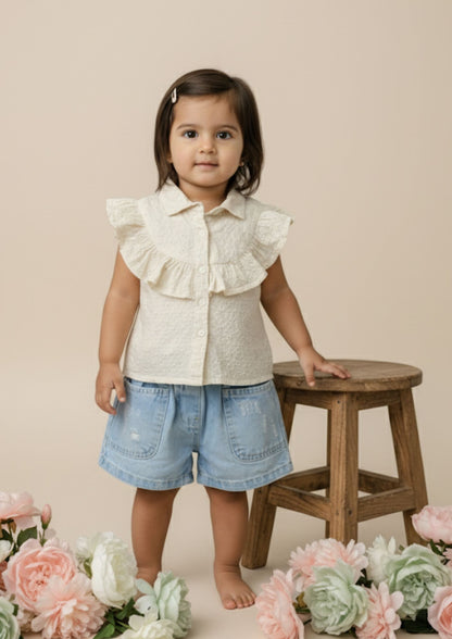 Cream Sleeveless Accoba Top and Light Blue Denim Torn Shorts