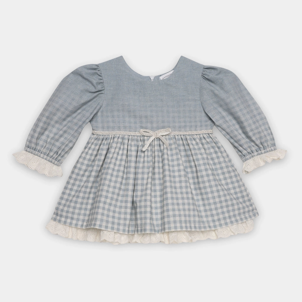 Children's blue checkered dress with long sleeves on a light gray background