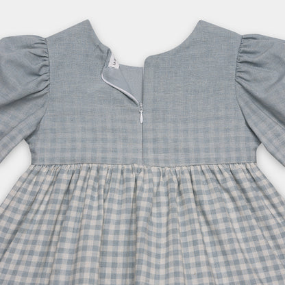 Gray checkered dress with long sleeves on a white background