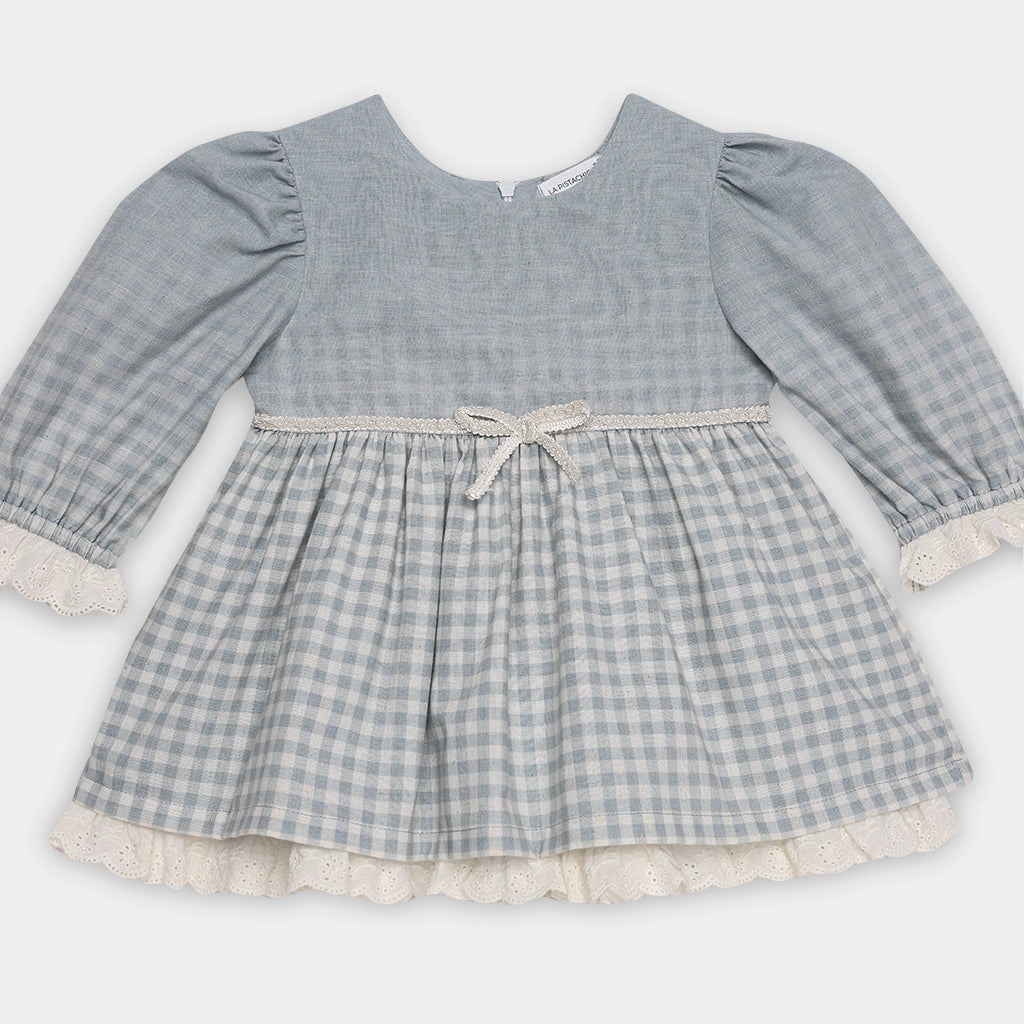 Blue checkered dress with long sleeves on a white background