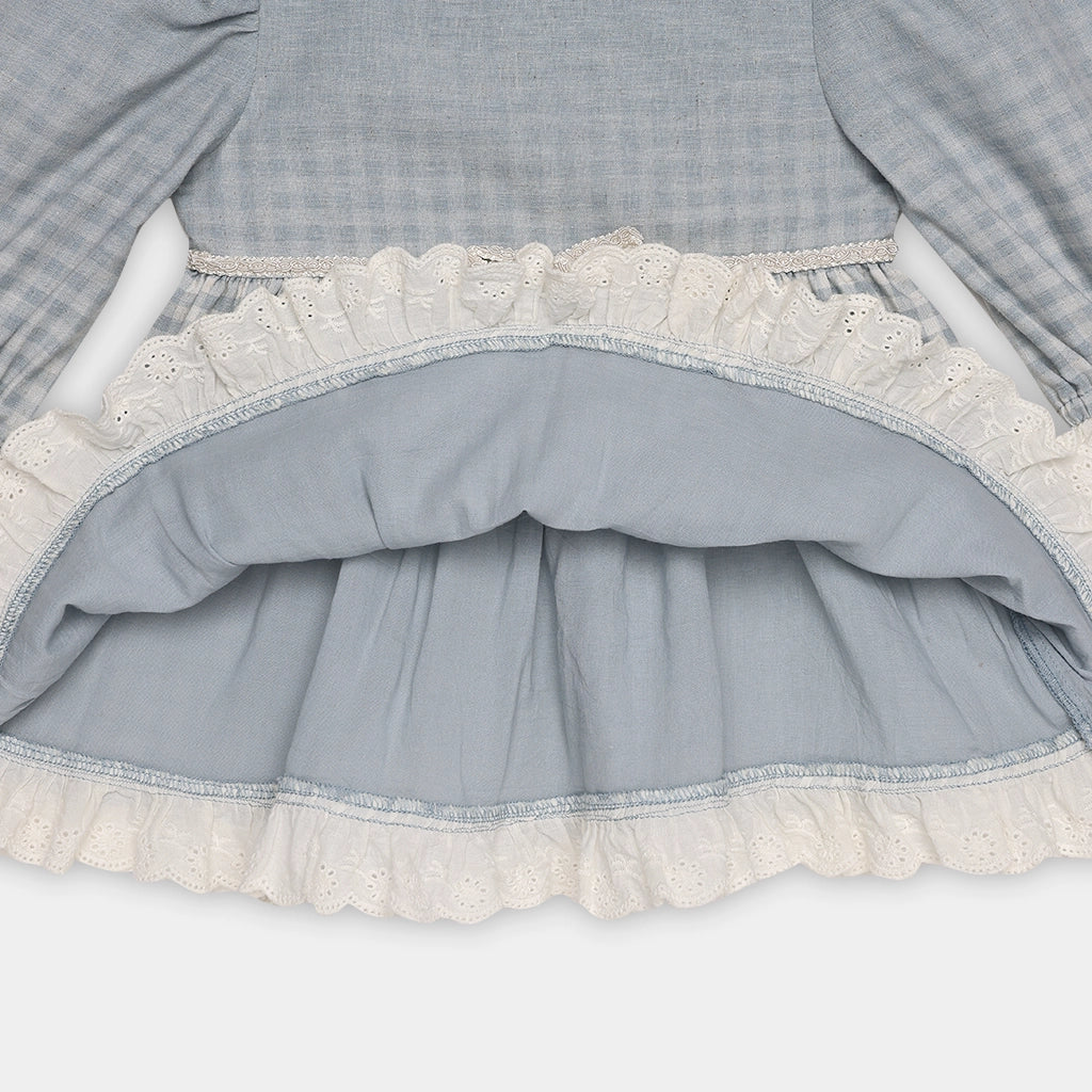 Gray dress with lace trim on a white background