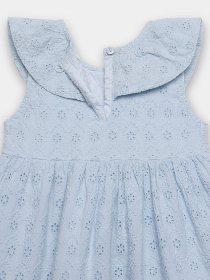 Light blue dress with a ruffled collar on a white background