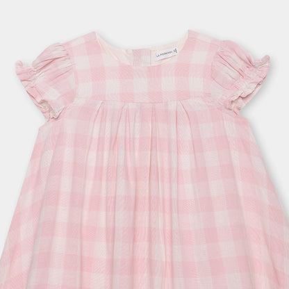 Pink and white checkered dress on a light gray background
