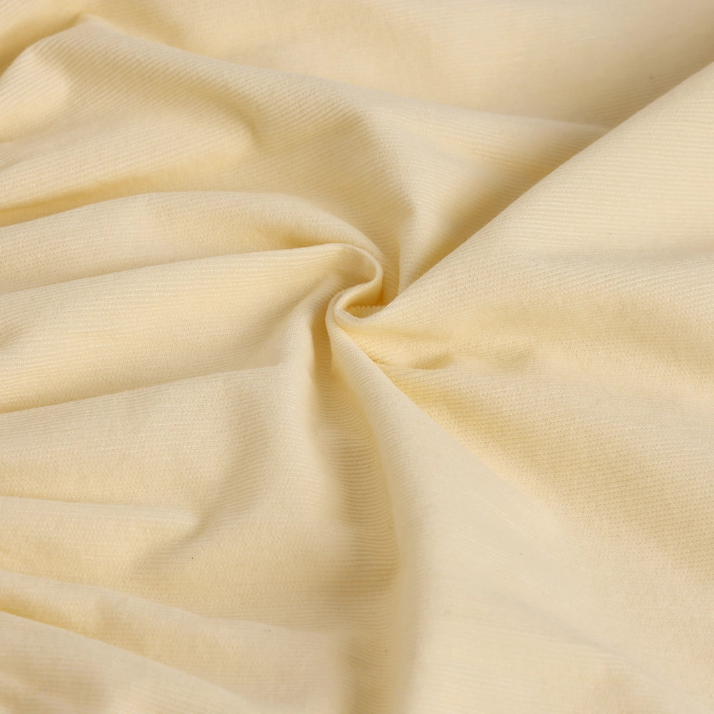 Close-up of beige fabric with folds