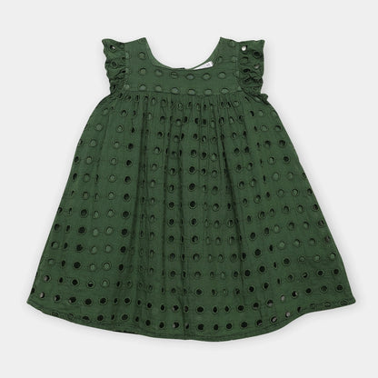 Green dress with cut-out pattern on a white background