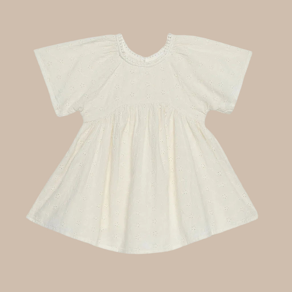 Beige baby dress on a white background