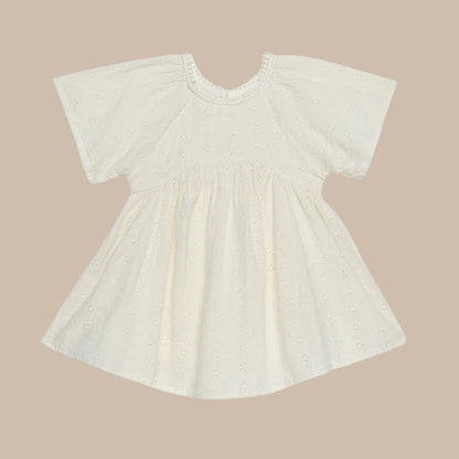 Beige baby dress on a white background