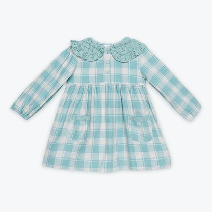 Children's blue and white checkered dress with a collar on a light gray background