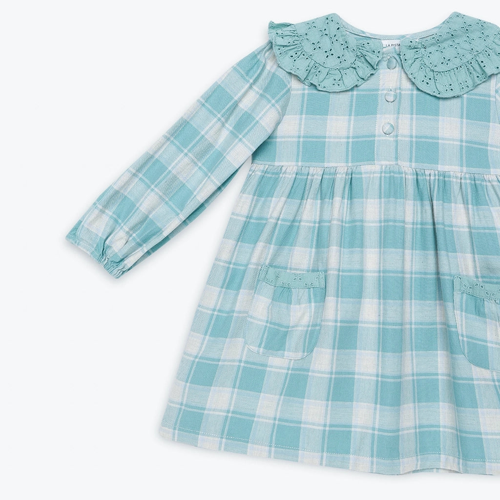 Children's blue and white checkered dress with a frilled collar on a white background