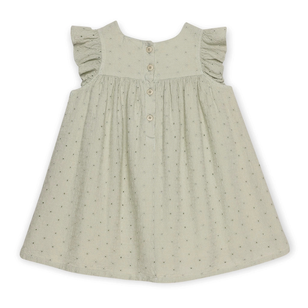 Green polka dot dress with ruffled sleeves on a white background