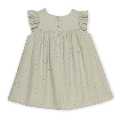 Green polka dot dress with ruffled sleeves on a white background