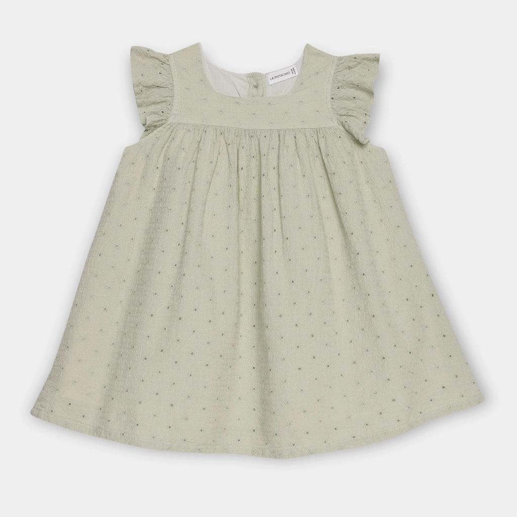 Green dress with ruffled sleeves on a white background
