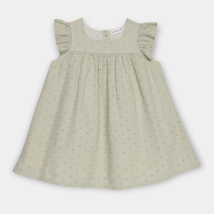 Green dress with ruffled sleeves on a white background