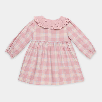 Pink checkered dress with a ruffled collar on a white background