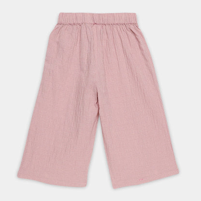 Pink checkered pants on a white background