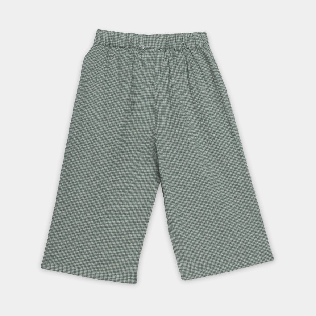 Green checkered pants on a light gray background