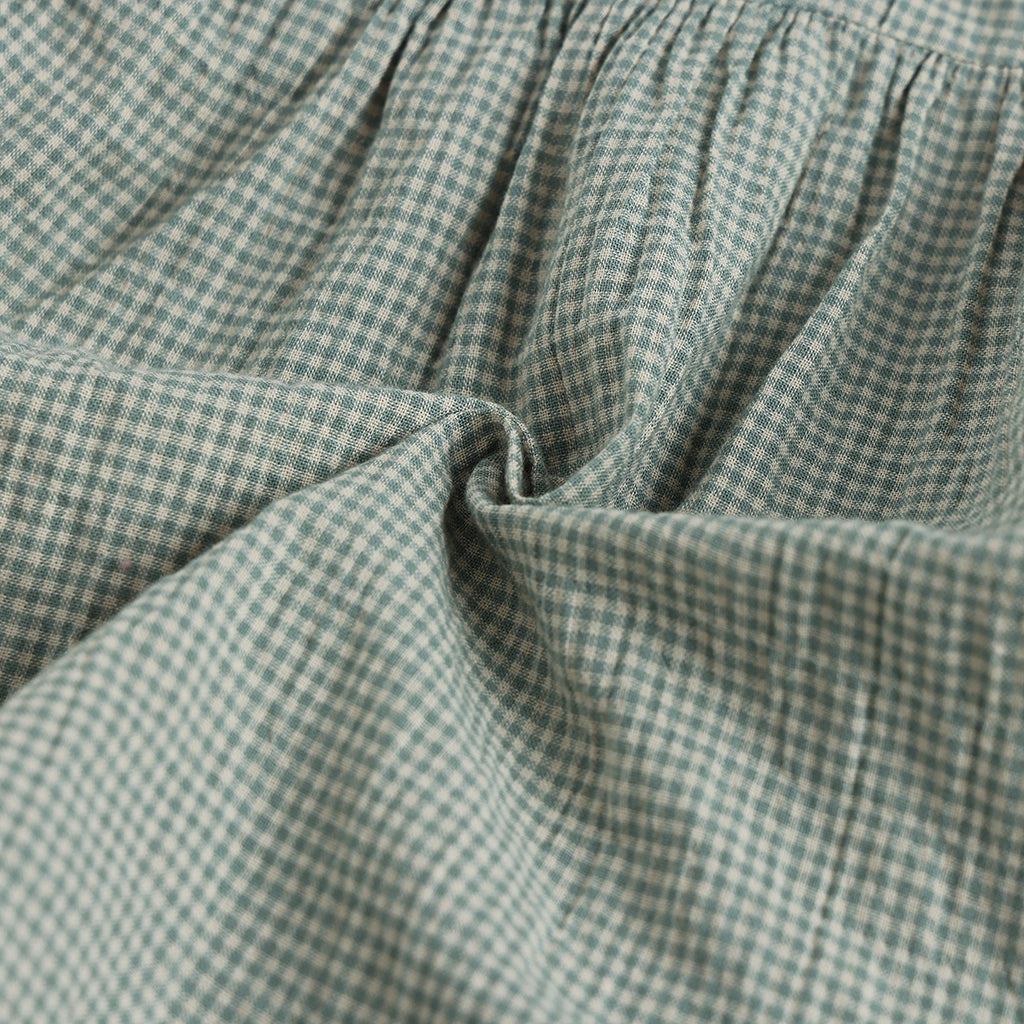 Close-up of green and white checkered fabric