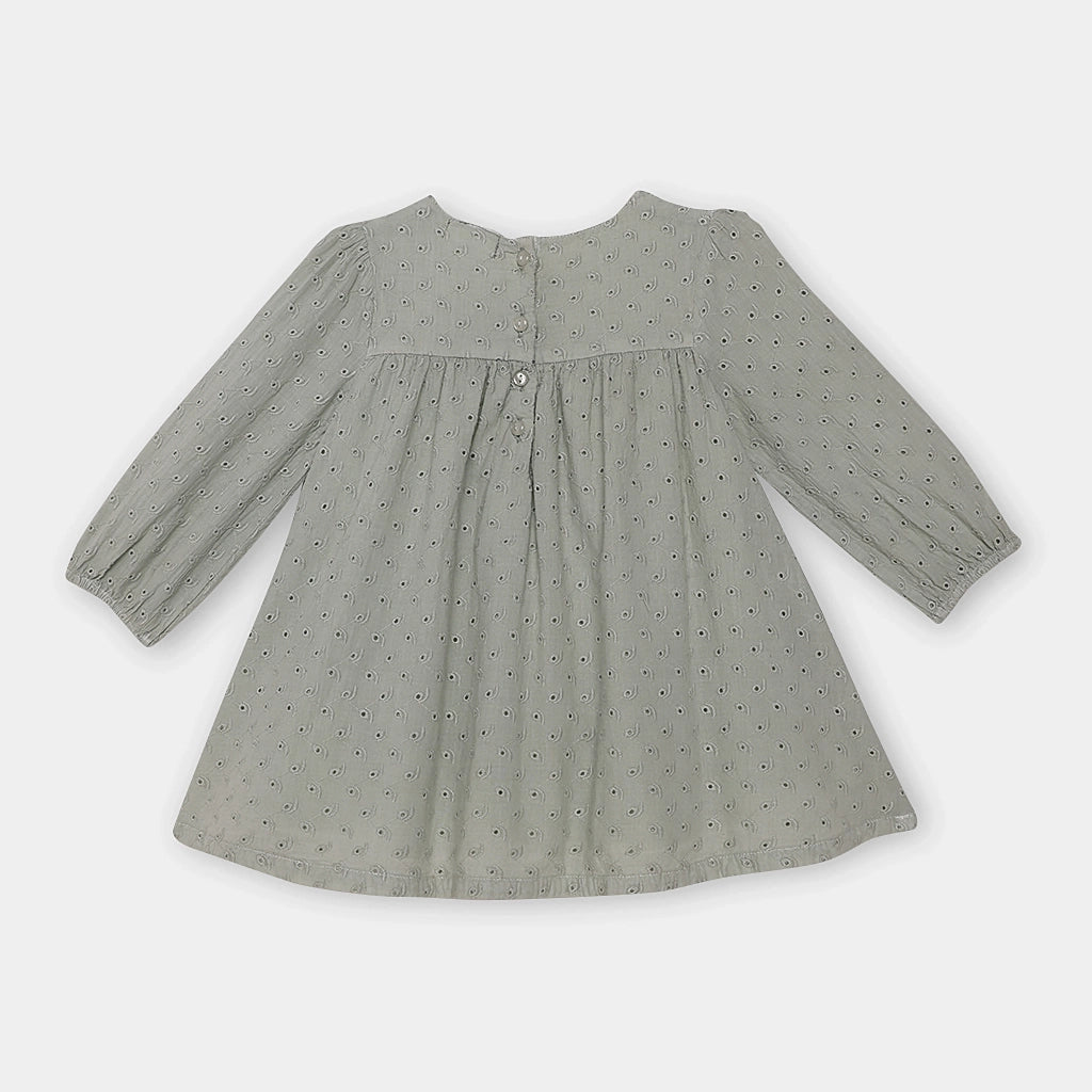 Gray dress with long sleeves on a light gray background