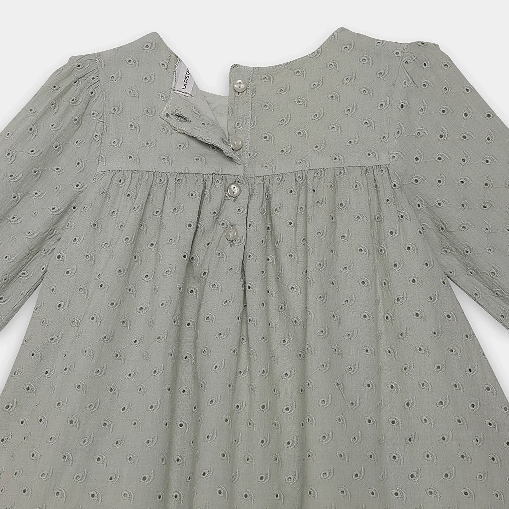Gray dress with a subtle pattern on a white background