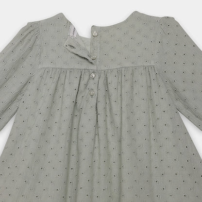 Gray dress with a subtle pattern on a white background