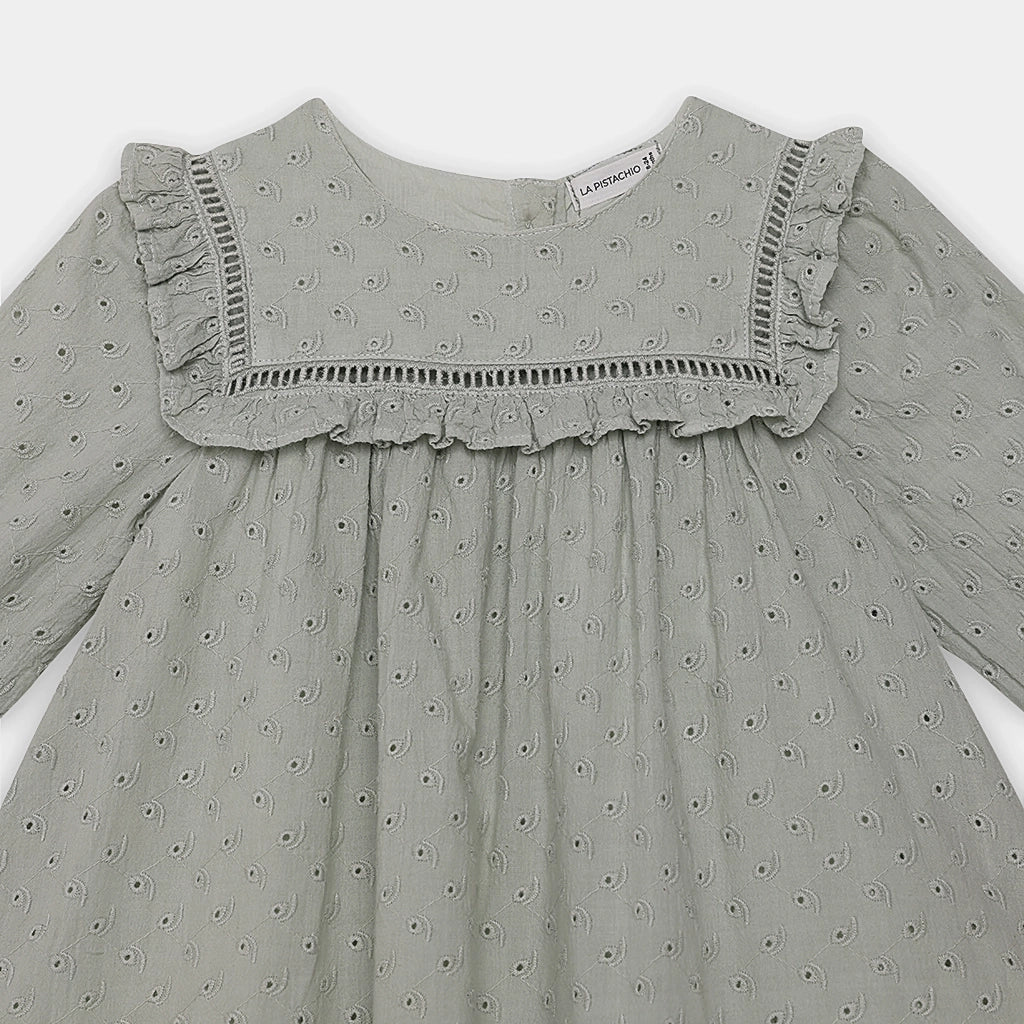 Gray dress with ruffled neckline on a white background