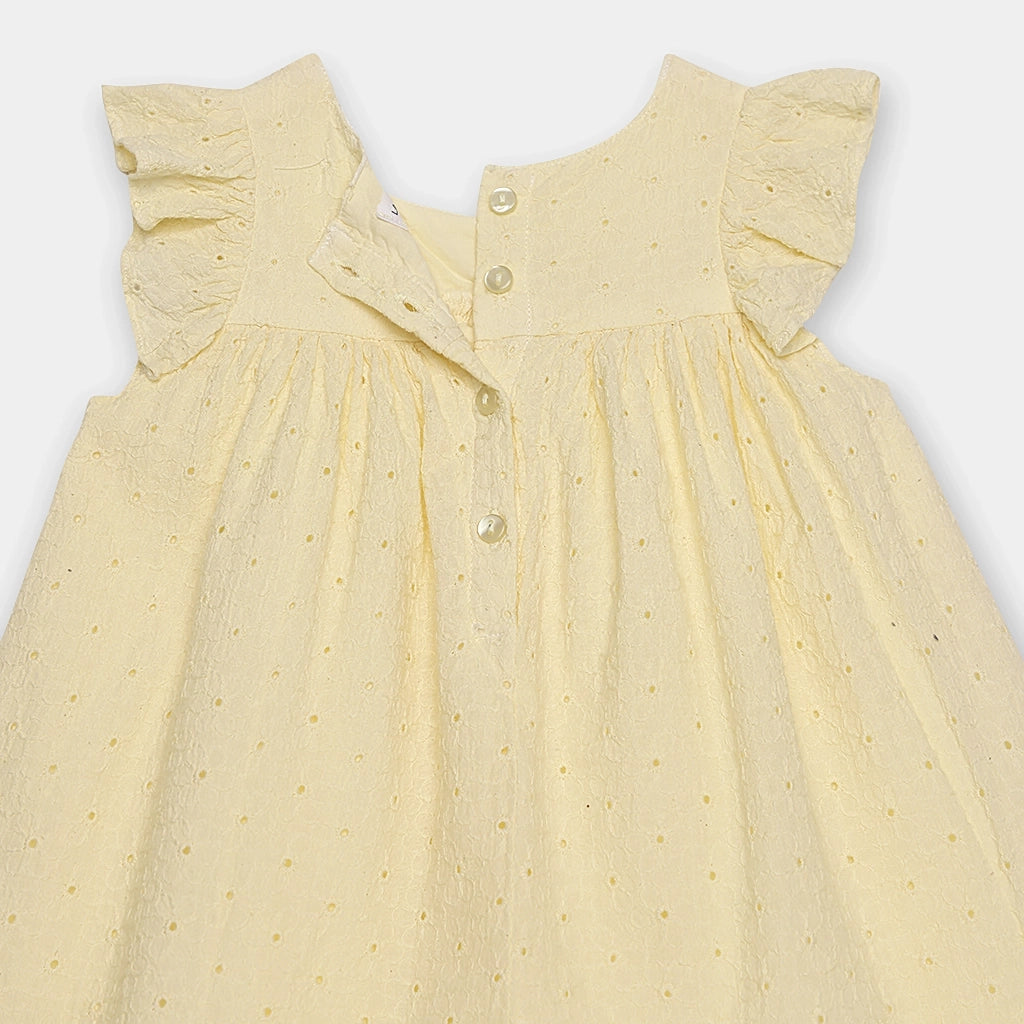Yellow dress with ruffled sleeves on a white background