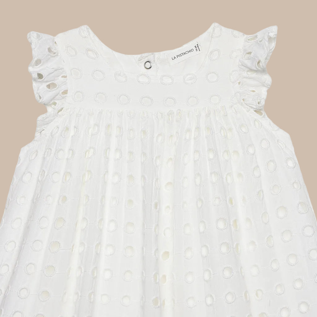 White dress with ruffled sleeves on a white background
