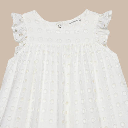White dress with ruffled sleeves on a white background