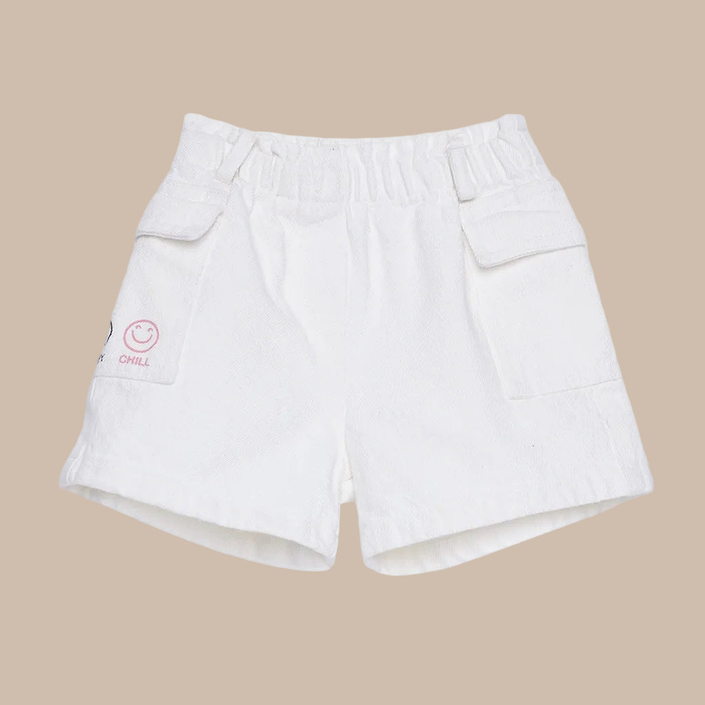 White shorts with a smiley face logo on a white background