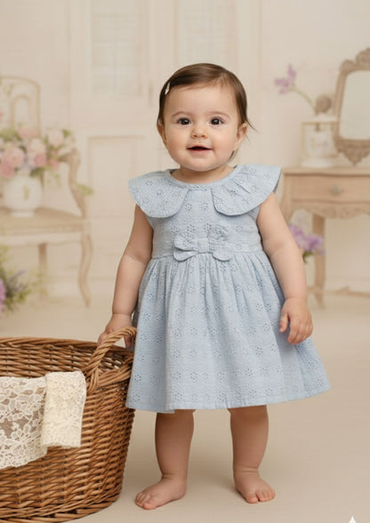 Baby girl standing wearing bluebell hakoba cotton frock